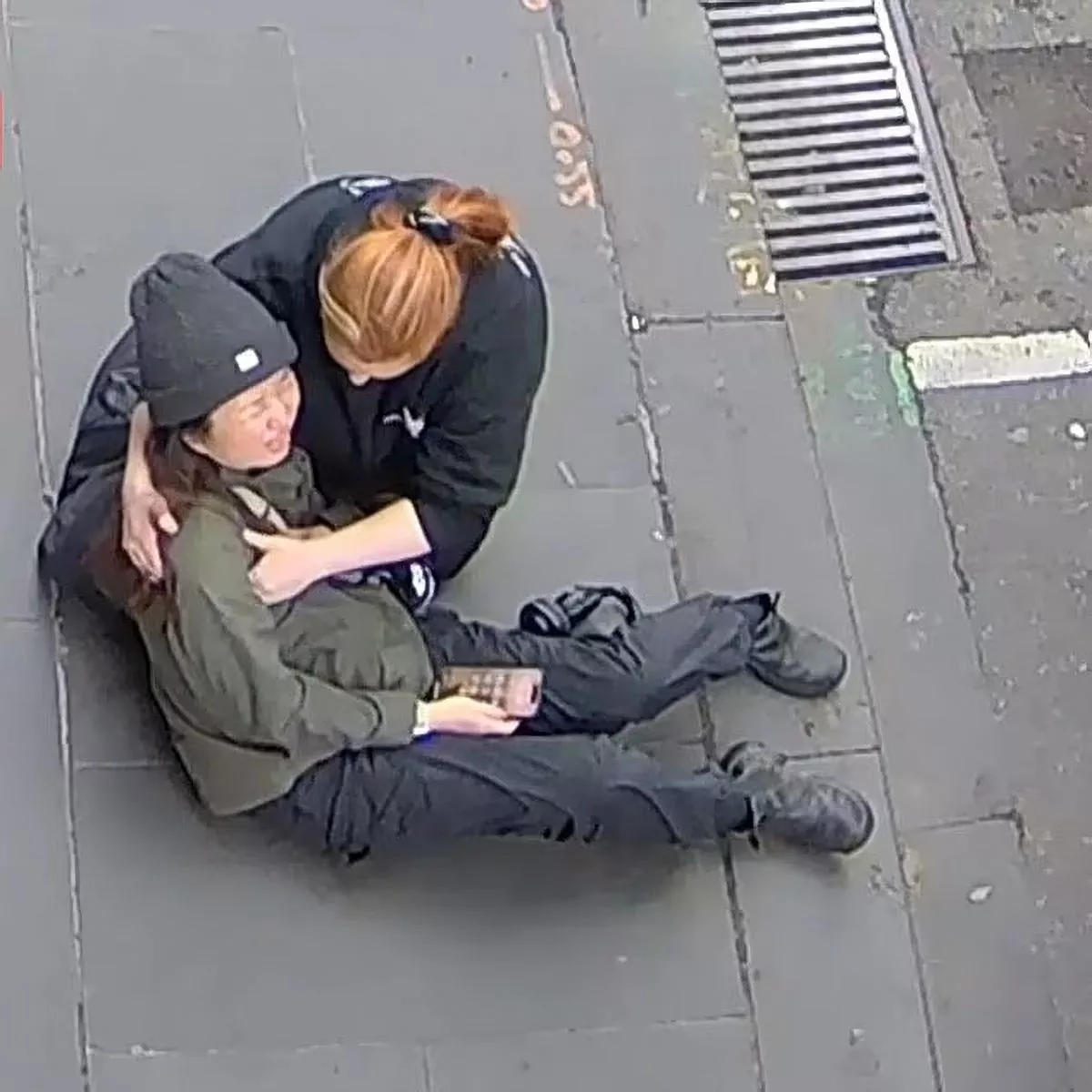 Horror moment woman is stabbed in the chest by stranger while she walks to work (video)